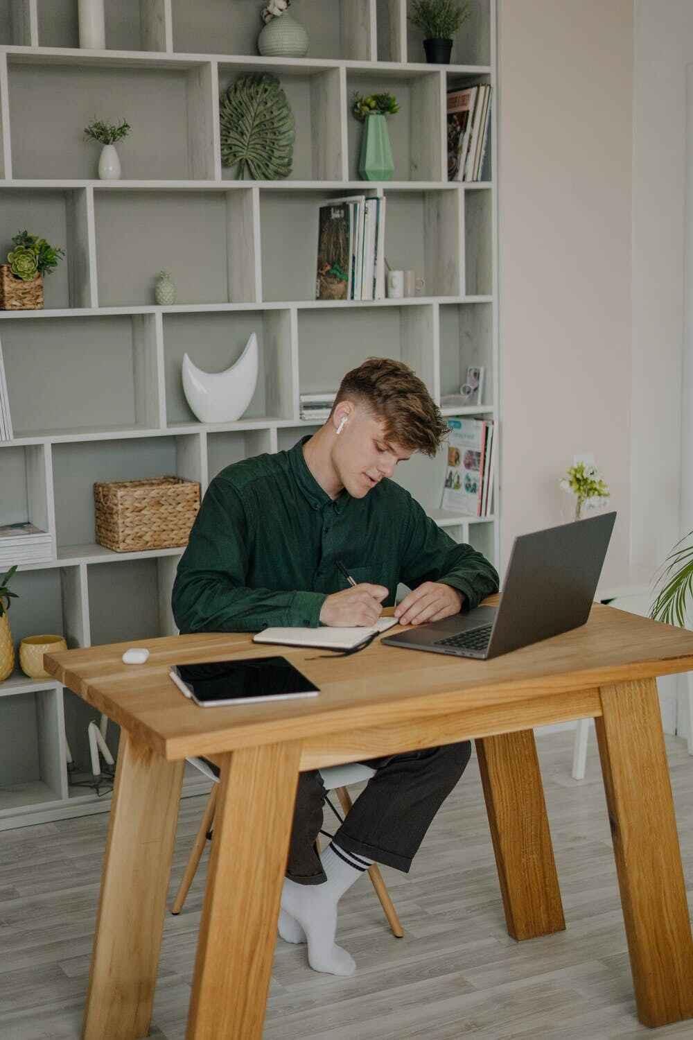 Teacher guiding a student through a one-on-one academic consultation